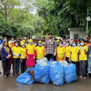 Maid In India Leads Cleanliness Drive at Delhi Protest Site. Yellow T-Shirts, Blue Bags, One Mission.
