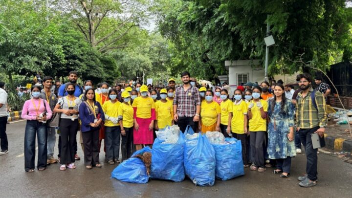 Maid In India Leads Cleanliness Drive at Delhi Protest Site. Yellow T-Shirts, Blue Bags, One Mission.